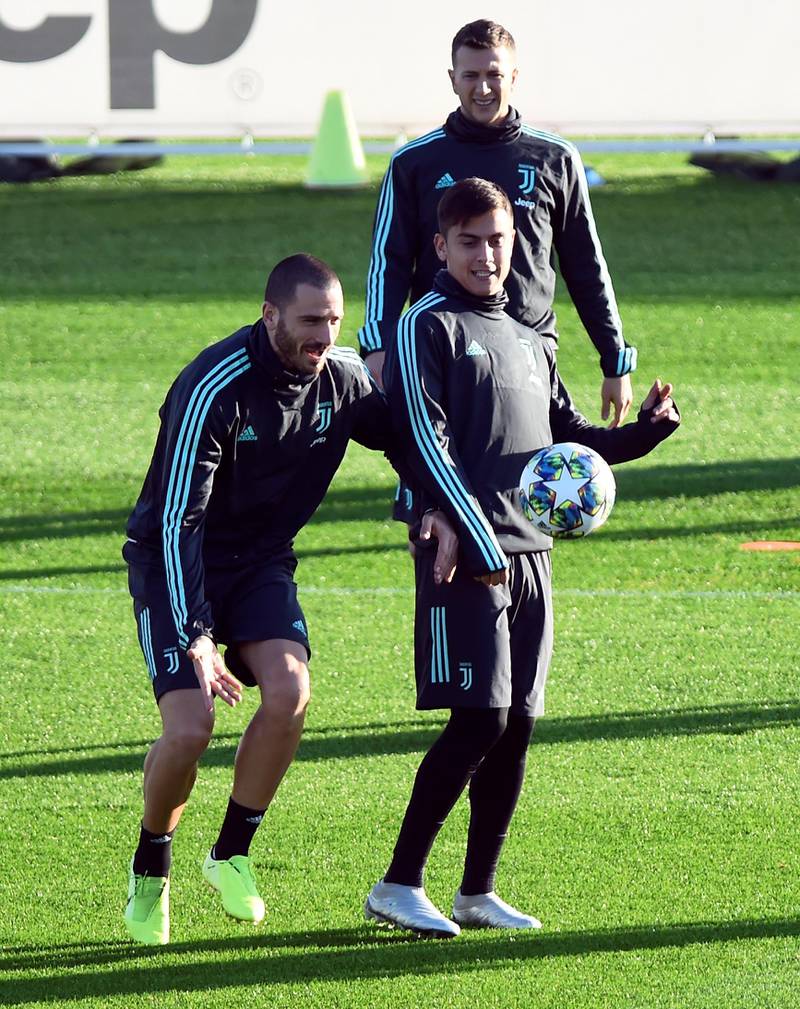 Juventus' Paulo Dybala and Leonardo Bonucci during training. Reuters