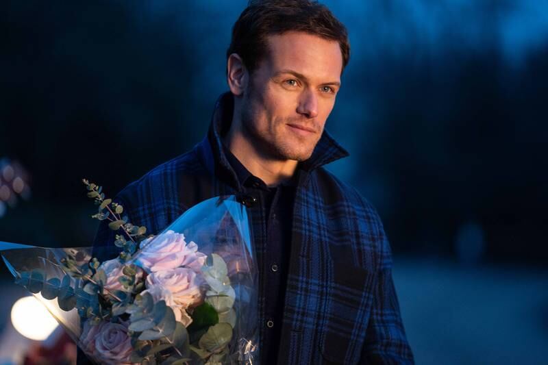 Sam Heughan plays journalist Rob Burns, who is writing a feature profile on singer Celine Dion