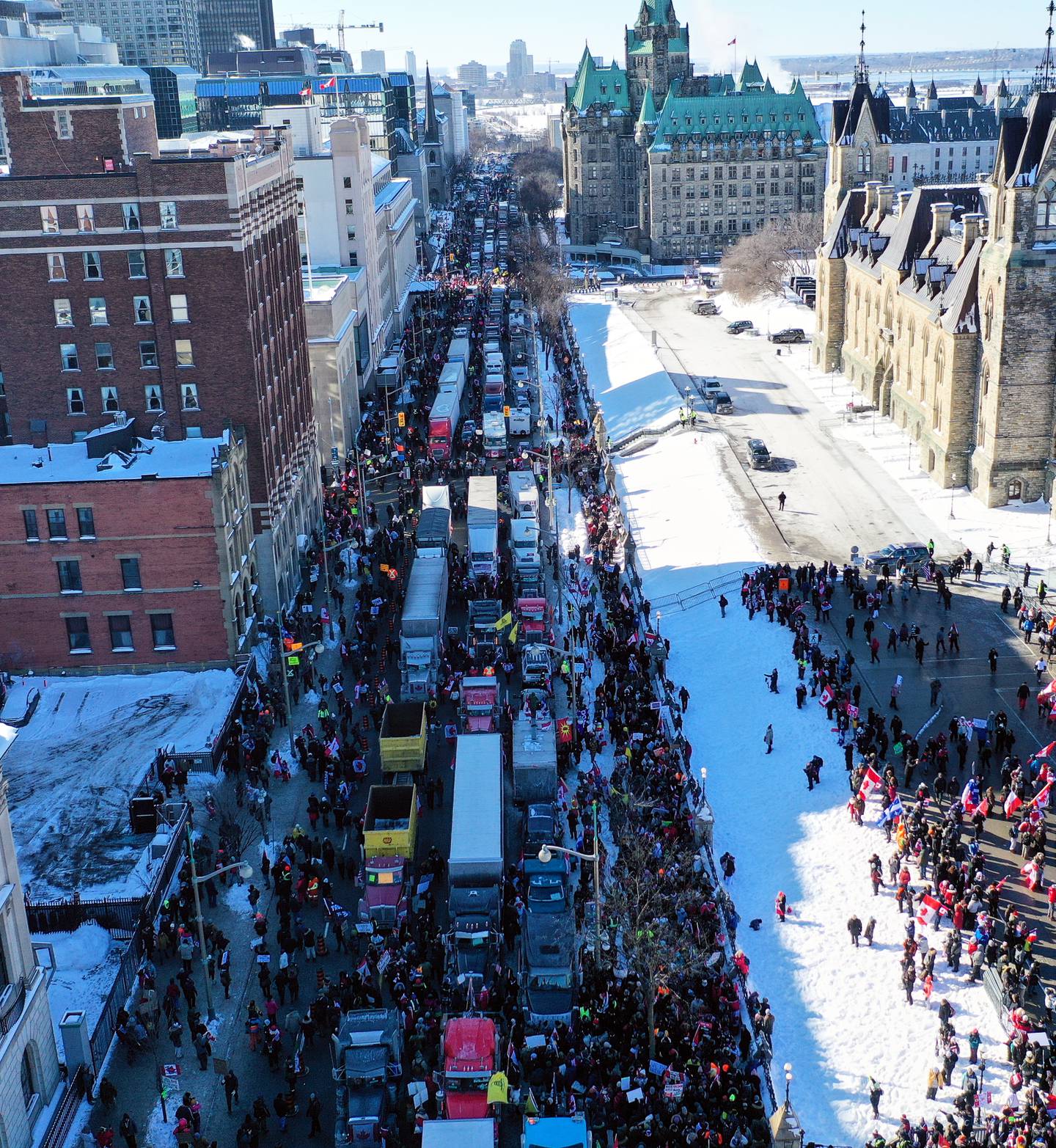 Lorries block the street as people protest in front of Parliament Hill in Ottawa. EPA