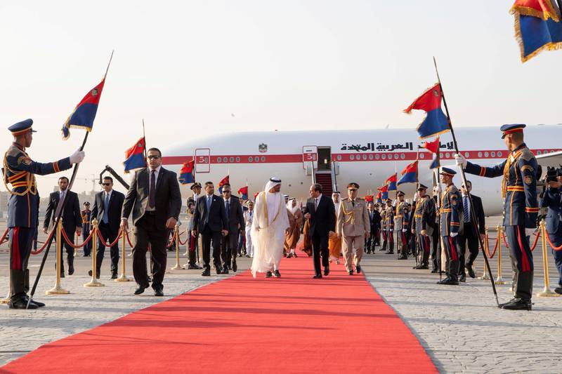 CAIRO, EGYPT - May 15, 2019: HH Sheikh Mohamed bin Zayed Al Nahyan Crown Prince of Abu Dhabi Deputy Supreme Commander of the UAE Armed Forces (center L), is received by HE Abdel Fattah El Sisi, President of Egypt (center R), upon arrival at Cairo international Airport.

(  Saeed Al Neyadi / Ministry of Presidential Affairs )
---