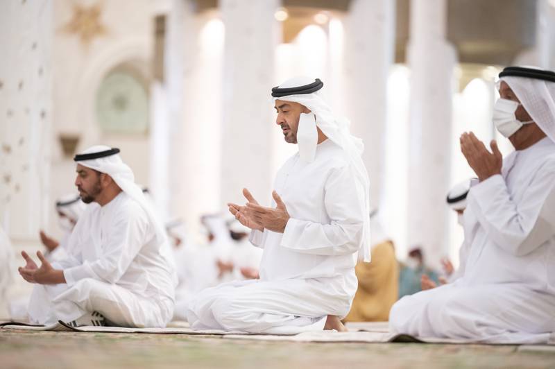 Sheikh Mohamed bin Zayed, Crown Prince of Abu Dhabi and Deputy Supreme Commander of the Armed Forces, performs Eid Al Adha prayers alongside Sheikh Hamdan bin Zayed, Ruler’s Representative in Al Dhafra Region, and Sheikh Suroor bin Mohammed, at the Sheikh Zayed Grand Mosque, in Abu Dhabi.