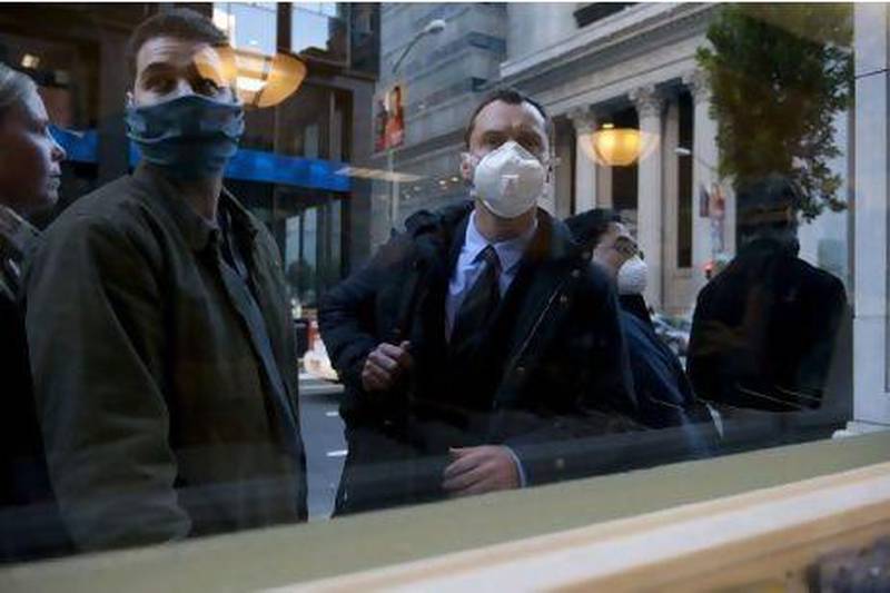 Jude Law, right, as Alan Krumwiede in the thriller Contagion. Photo: Warner Bros. Pictures