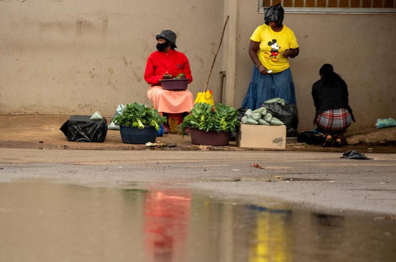 Street vendors sell vegetables on a pavement in Thokoza, east of Johannesburg, South Africa. AP Photo