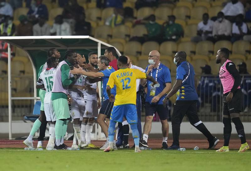 A scuffle breaks out after between Gabon and Ghana players and team official during the African Cup of Nations 2022 group C soccer match between Gabon and Ghana at the Ahmadou Ahidjo stadium in Yaounde, Cameroon, Friday, Jan.  14, 2022.  (AP Photo / Themba Hadebe)