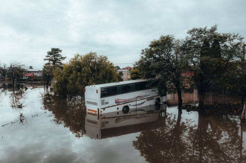 A bus in a flooded area in Lenasia, South Africa, after heavy rains.  AFP