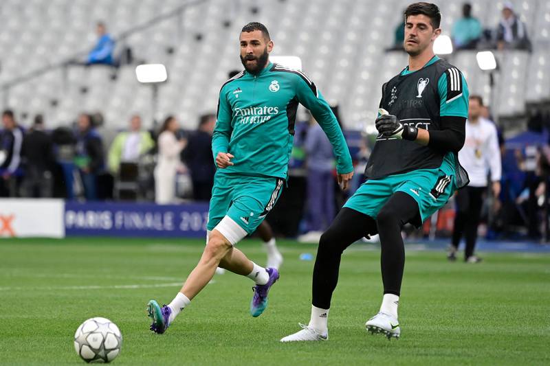 Karim Benzema and Real Madrid goalkeeper Thibaut Courtois take part in a training session. AFP