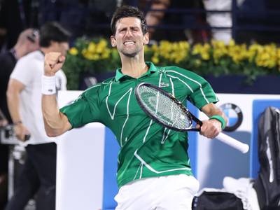 Novak Djokovic celebrates after winning the 2020 Dubai Duty Free Tennis Championships final against Stefanos Tsitsipas on Saturday, 29 February, 2020. EPA