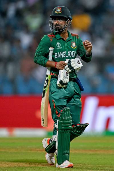 Bangladesh's Liton Das walks back to the pavilion after his dismissal. AFP