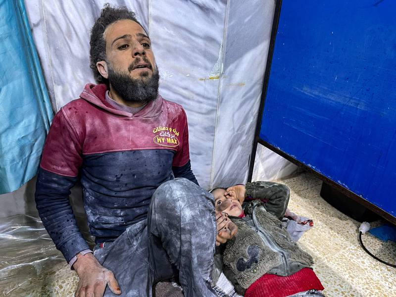 An injured man awaits treatment in Bab al-Hawa hospital, Idlib, after Monday’s deadly earthquake struck Syria and Turkey. AFP