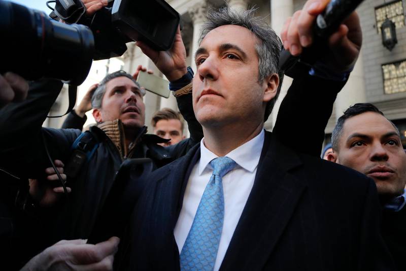 In this Nov. 29, 2018, photo, Michael Cohen walks out of federal court in New York. A pattern of deception by advisers to President Donald Trump, aimed at covering up Russia-related contacts during the 2016 campaign and transition, has unspooled bit by bit in criminal cases from special counsel Robert Mueller.  (AP Photo/Julie Jacobson)