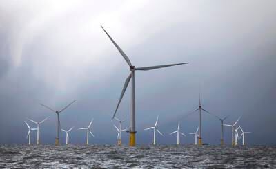 Hydrogen is classed as green when it is produced from water using renewable energy sources such as wind turbines. AFP