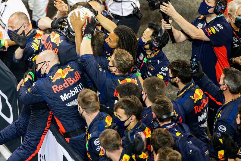 Max Verstappen celebrates with his Red Bull team after winning in Abu Dhabi. Getty