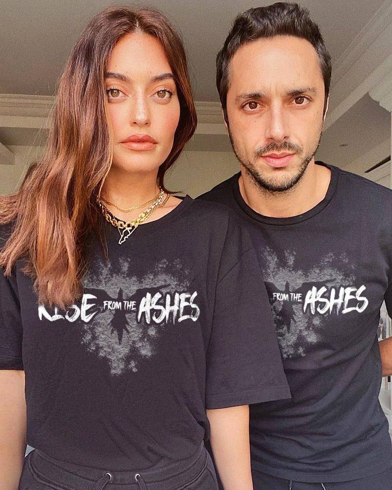 Lebanese influencer Karen Wazen Bakhazi and husband Elias Bakhaazi wearing Zuhair Murad's Rise from the Ashes T-shirt. Instagram /  karenwazen