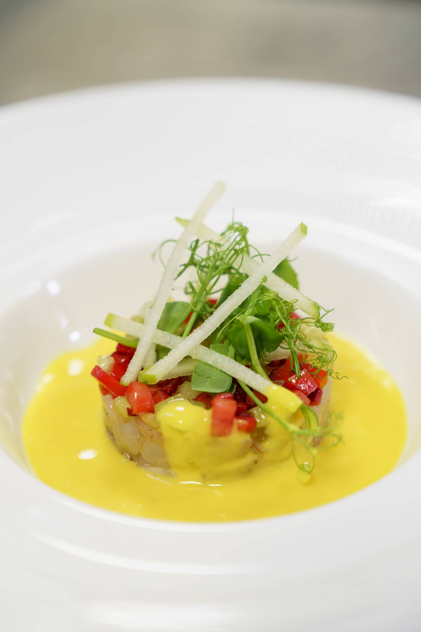 Tartare with sea bass, red prawns and yellow cherry tomato coulis at Talea by Antonio Guida. Photo: Mandarin Oriental Emirates Palace