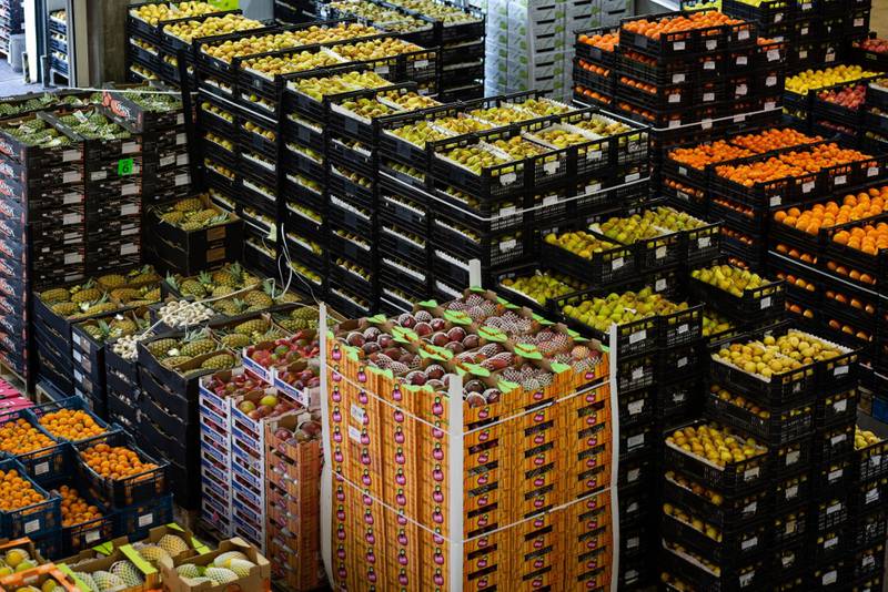 Boxes and crates of fresh fruit stacked at the Mercado Abastecedor do Porto distributors in Porto, Portugal.  Global food prices are rising as crop trade is disrupted by the war in Ukraine.  Bloomberg