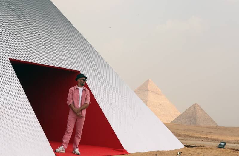 French street artist JR with his installation 'Inside out Giza' near the Pyramids. EPA