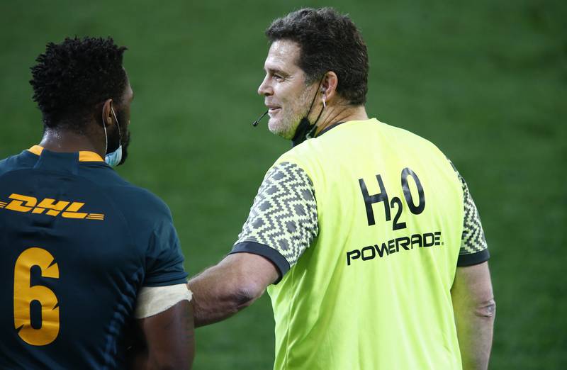 South Africa's captain Siya Kolisi with Rassie Erasmus at the final whistle.