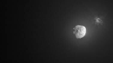 An image that illustrates this article Remarkable images show moment Nasa’s Dart spacecraft smashed into asteroid