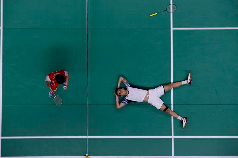 Lakshya Shen, right, of India reacts after winning the men's singles final against Anthony Ginting of Indonesia at the BWF Thomas and Uber Cup in Thailand on Sunday. EPA