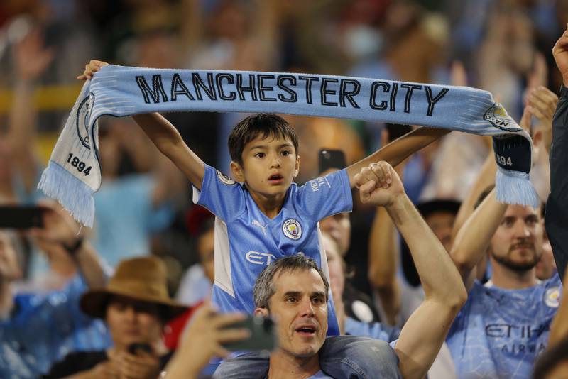 A Manchester City fan cheers on the team during the pre-season friendly match at Lambeau Field. Getty
