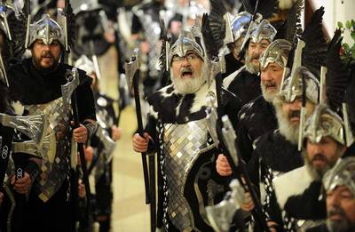 Participants dressed as Vikings prepare to participate in the annual Up Helly Aa festival in Lerwick, Shetland Islands, on January 28, 2014. Up Helly Aa celebrates the influence of the Scandinavian Vikings in the Shetland Islands and culminates with up to 1,000 ‘guizers’ (men in costume) throwing flaming torches into their Viking longboat and setting it alight later in the evening. Andy Buchanan / AFP Photo