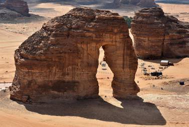 (FILES) This file photo taken on February 11, 2019, shows an aerial view of the Elephant rock in the Ula desert near the northwestern Saudi town of al-Ula. Saudi Arabia said on September 27, 2019 it will offer tourist visas for the first time, opening up the ultra-conservative kingdom to holidaymakers as part of a push to diversify its economy away from oil. Kickstarting tourism is one of the centrepieces of Crown Prince Mohammed bin Salman's Vision 2030 reform programme to prepare the biggest Arab economy for a post-oil era. / AFP / FAYEZ NURELDINE