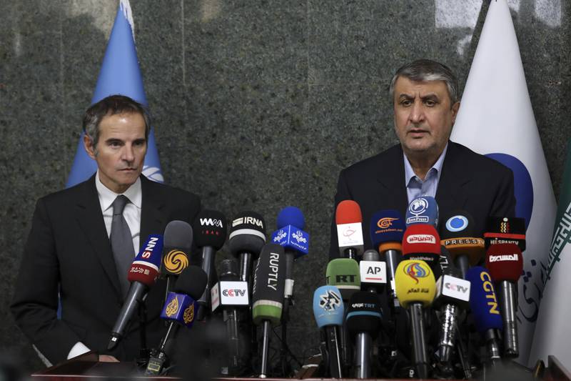 Head of the Atomic Energy Organization of Iran Mohammad Eslami, right, speaks in a joint press briefing with International Atomic Energy Organization, IAEA, Director General Rafael Mariano Grossi in Tehran, Saturday, March 5, 2022.  AP Photo