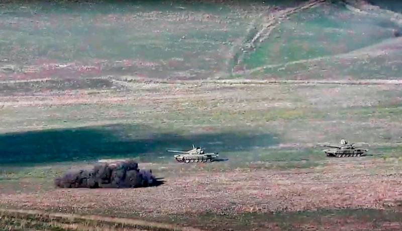 In this image taken from a footage released by Armenian Defense Ministry, Armenian army destroys Azerbaijani tanks at the contact line of the self-proclaimed Republic of Nagorno-Karabakh, Azerbaijan.  AP
