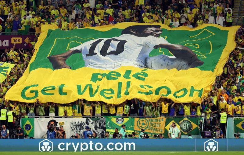 Brazil fans show their support for Pele during the South Korea last 16 clash. EPA