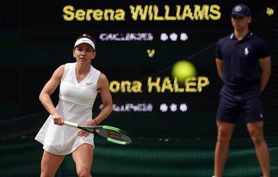 Simona Halep looks on as she returns a shot to Serena Williams. Getty Images