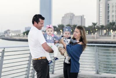 Berend Lens Van Rijn, his wife, Joanna, and their baby twins, Lilly and Leonard, at the Marasy Marina. Reem Mohammed / The National 