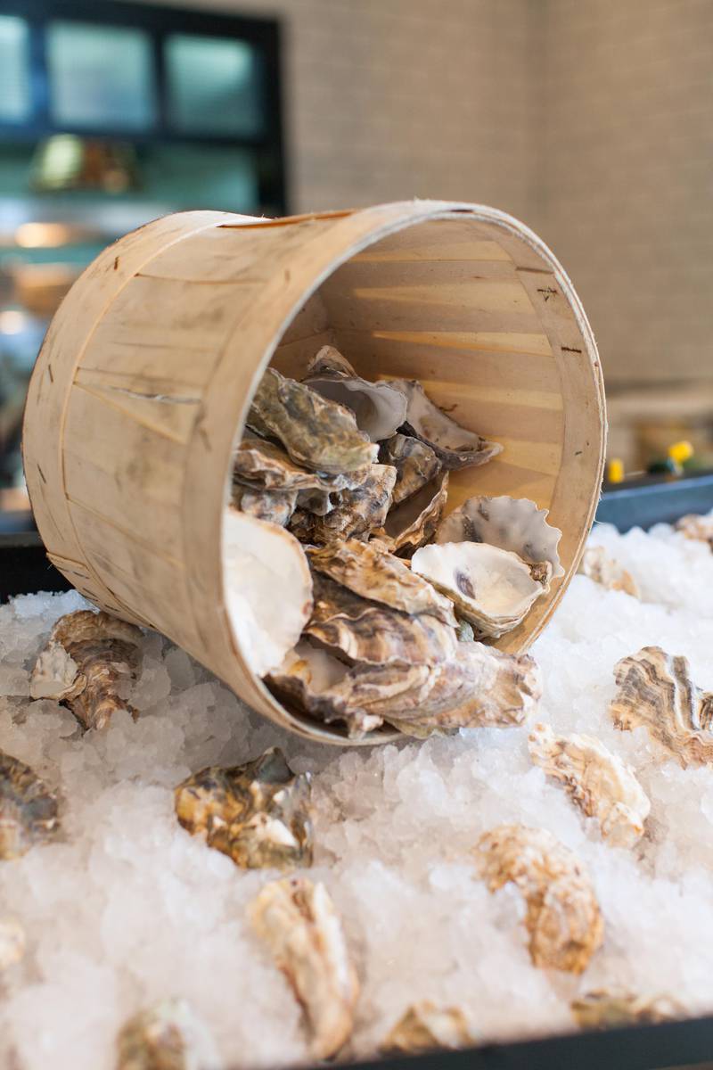 Dubai, United Arab Emirates - April 21 2016 - Raw oysters on ice at the Maine Oyster Bar & Grill. Reporter: Lucy Barnard. Section: Business (Razan Alzayani for the National) *** Local Caption ***  RA_20160421_The_Maine-31.jpg