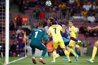 Barcelona forward Antoine Griezmann scores to give his side a sixth-minute lead. EPA