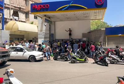 A queue at a Beirut petrol station. Lebanon remains without a fully functioning Cabinet, following a massive explosion at Beirut port that killed more than 200 people last August. Reuters