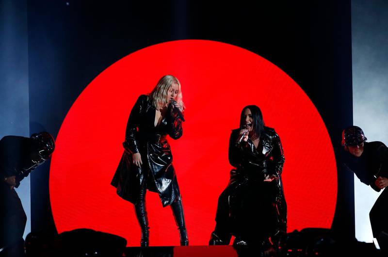 Christina Aguilera with Demi Lovato perform 'Fall In Line'. Reuters