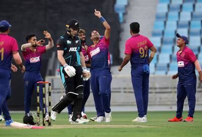 UAE bowler Zahoor Khan after taking the wicket of New Zealand's Dane Cleaver for four.