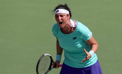DUBAI, UNITED ARAB EMIRATES - FEBRUARY 18: Ons Jabeur of Tunisia reacts in her match against Donna Vekic of Croatia during day two of the WTA Dubai Duty Free Tennis Championships at Dubai Tennis Stadium on February 18, 2019 in Dubai, United Arab Emirates. (Photo by Francois Nel/Getty Images)