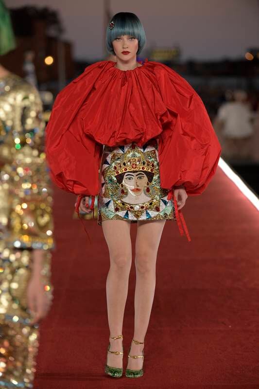 A model presents a look from Dolce & Gabbana's Alta Moda collection in Venice, Italy.