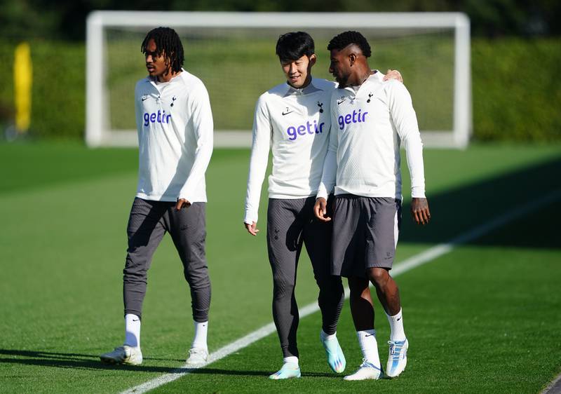 Djed Spence, left, Son Heung-min, centre, and Emerson Royal at the Tottenham Hotspur Training Ground. PA