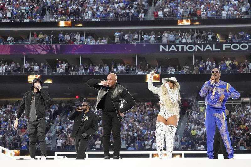 From left, Eminem, Kendrick Lamar, Dr Dre, Mary J Blige and Snoop Dogg come together at the end of the half-time show for the NFL Super Bowl LVI football game. AP