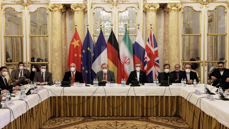 EU diplomat and chairman of the negotiation process Enrique Mora, centre-left, Iran's chief nuclear negotiator Ali Bagheri Kani, centre-right, and other delegates in Vienna during talks on Iran's nuclear programme this month. Reuters