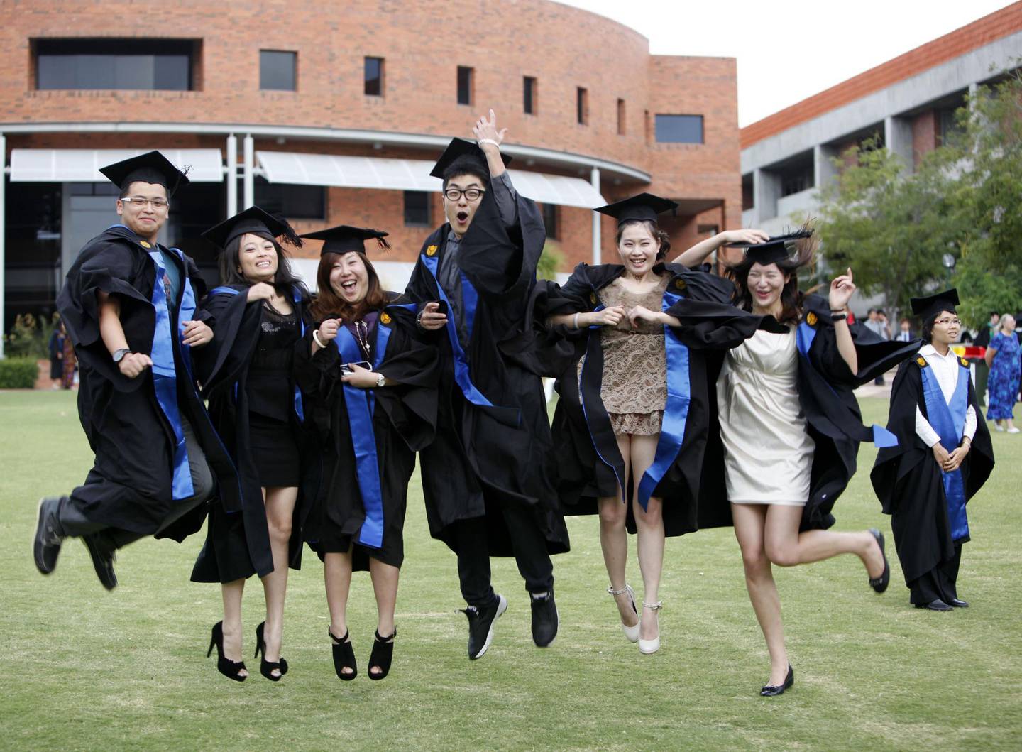 --FILE--Chinese students studying abroad dressed in academic gowns pose during a graduation photo shoot at Curtin University in Bentley, Perth, Western Australia, Australia, 11 February 2012.

In 2015, a total of 1.26 million Chinese students studied abroad, accounting for about 25 percent of all international students worldwide. According to an annual report by the Center for China and Globalization (CCG), China has become the single largest source of overseas students. The report, released on Dec. 12 and titled "Annual Report on the Development of Chinese Students Studying Abroad (2016)," was jointly published by CCG and the Social Science Academic Press (China). It is the fifth version of the research report, which was first published in 2012. According to CCG's research, China is the largest source of overseas students in English-speaking countries including the U.S., Canada, Britain and Australia. It is also the top source for Asian countries including Japan, South Korea and Singapore. Statistics show that Chinese students account for more than 30 percent of total overseas students in the U.S. and Canada, and about 62 percent of international students in South Korea in 2015. The report pointed out that China has been the largest source of overseas students in the U.S. for seven consecutive years, and the number of Chinese students earning bachelor's degrees surpassed the number of those doing graduate studies for the first time last year. Meanwhile, the number of younger students studying abroad is rising every year. A study conducted by CCG and MyCOS showed a significant increase in Chinese students studying in high schools outside of China. The proportion of Chinese students going abroad for high school jumped from 17 percent in 2012 to 27 percent in 2015. Data released last year by the U.S. Department of Homeland Security indicates that the number of Chinese students in middle and high schools in the U.S. has increased threefold in the last five years.No U