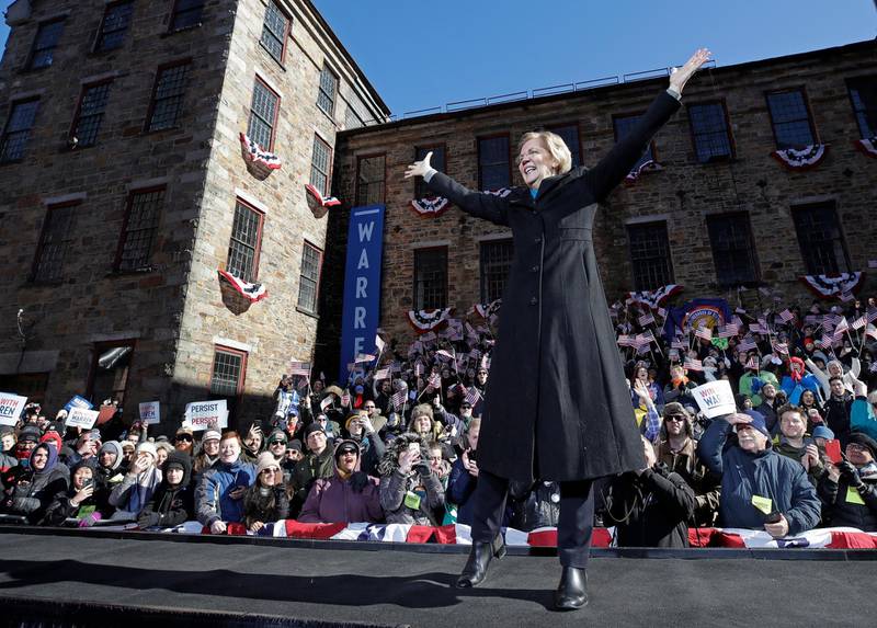 Sen. Elizabeth Warren, D-Mass., acknowledges cheers as she takes the stage during an event to formally launch her presidential campaign, Saturday, Feb. 9, 2019, in Lawrence, Mass. (AP Photo/Elise Amendola)