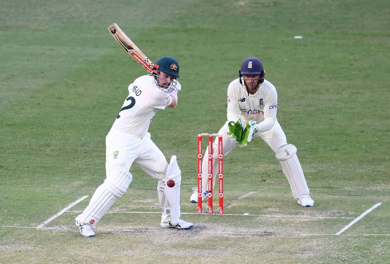 Australia's Travis Head plays a shot in front of England's Jos Buttler. AFP