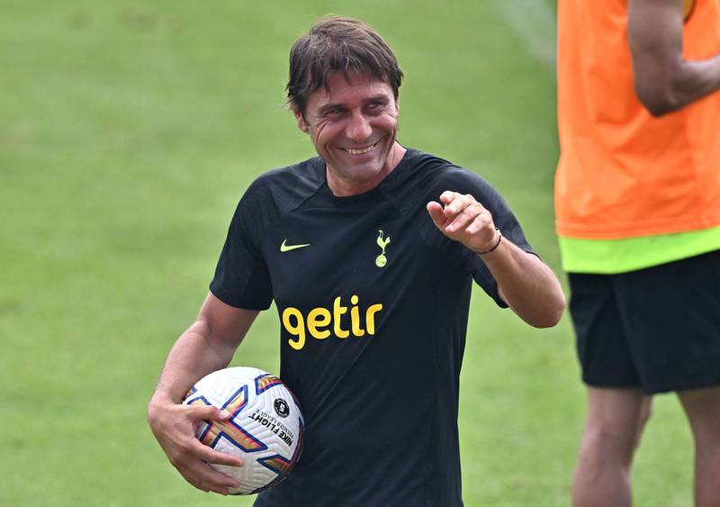 Tottenham Hotspur head coach Antonio Conte gestures to fans during an open training at Mokdong Stadium in Seoul on July 15, 2022, ahead of the pre-season football friendly against Sevilla. AFP