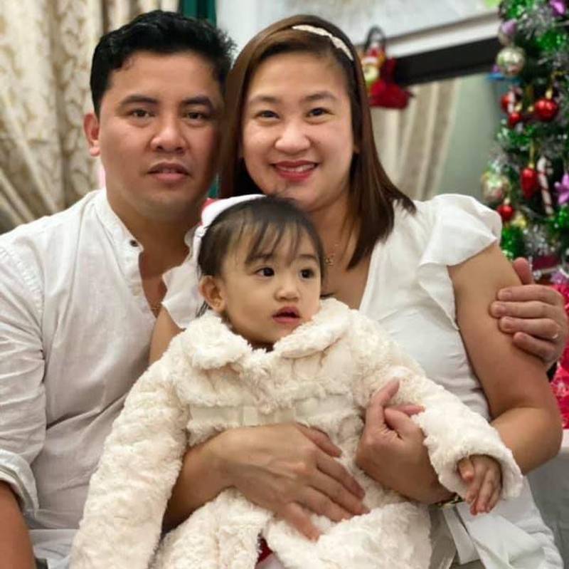 Emmanuel Grullo, a chef in Abu Dhabi, with his wife and daughter. He said his parents', brother's and cousin's homes were destroyed by Typhoon Rai and he is still trying to get in touch with them. Photo: Mr Grullo