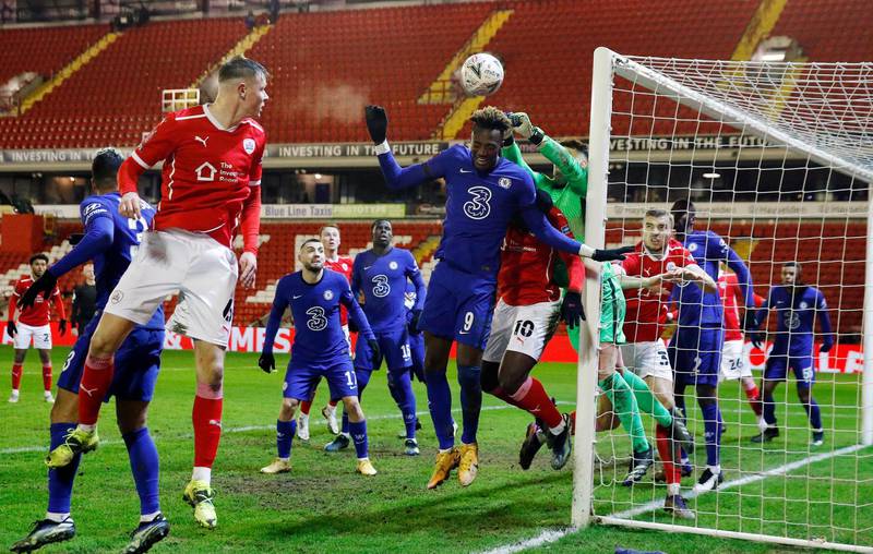 Soccer Football -  FA Cup - Fifth Round - Barnsley v Chelsea  - Oakwell, Barnsley, Britain - February 11, 2021 Chelsea's Tammy Abraham clears the ball off the line REUTERS/Phil Noble