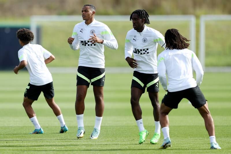 Manuel Akanji, second from left, trains with Manchester City teammates. Getty 