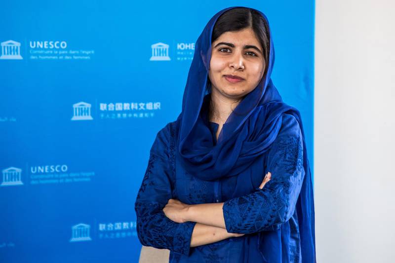 FILE PHOTO: Nobel Peace Prize laureate Malala Yousafzai poses for photographs during the Education and Development G7 Ministers Summit in Paris, France, July 5, 2019. Christophe Petit Tesson/Pool via REUTERS/File Photo