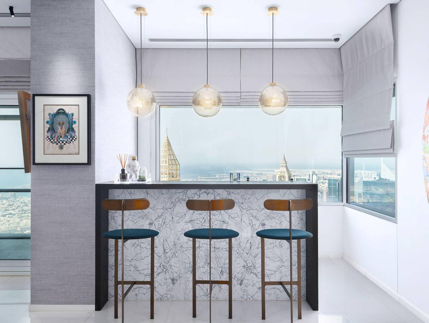 A sleek bar area in the Index Tower duplex, DIFC. Courtesy Luxhabitat Sotheby's International Realty